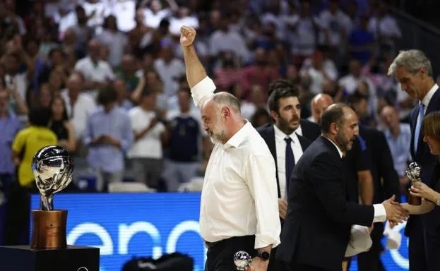 Pablo Laso celebrates Real Madrid's ACB League title.
