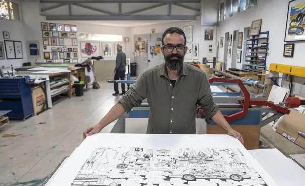 Sergio García, with one of his works.