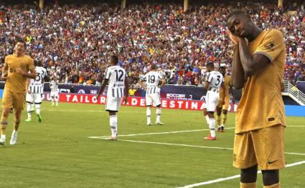 Dembélé celebrates one of his two goals against Juventus. 